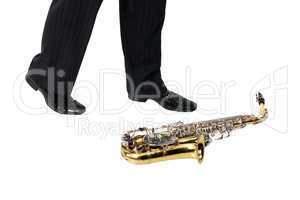 Sax on the floor, men's foot