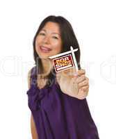 Multiethnic Woman Holding Small Sold Real Estate Sign