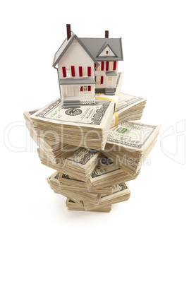 Small House on Stacks of Hundred Dollar Bills