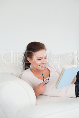 Portrait of a woman reading a book