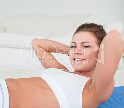 Close up of an athletic brunette exercising