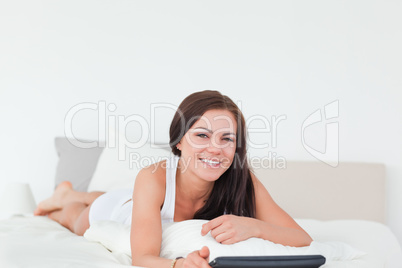 Smiling cute woman with a tablet Smiling cute woman with a tablet