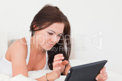 Young brunette with a tablet Young brunette with a tablet