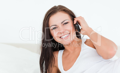 Young brunette using her phone