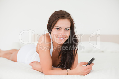 Beautiful young woman with her cellphone