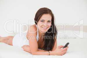Beautiful young woman with her cellphone