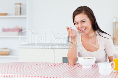 Beautiful woman eating her breakfast