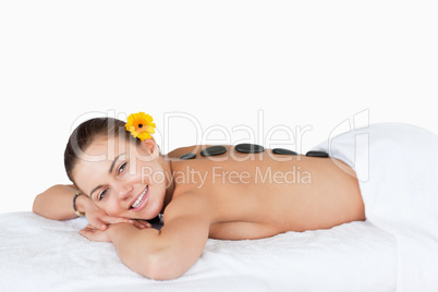 Young woman having a LaStone therapy