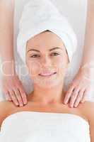 Beautiful woman enjoying a shoulder massage