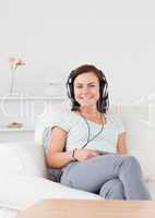 Smiling woman listening to music