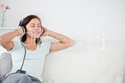 Lovely brunette listening to music