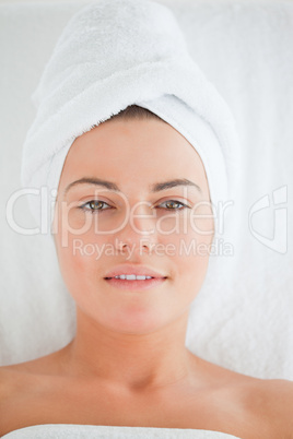 Portrait of a young woman wearing a towel