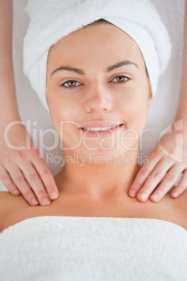 Young woman having a shoulder massage