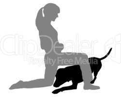 Frau trainiert mit Hund