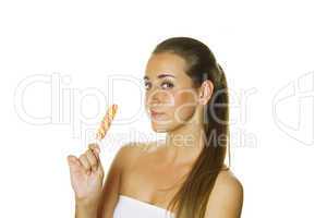 Attractive girl with a lollipop