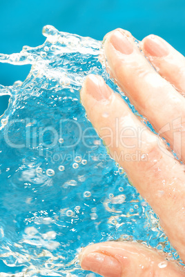 Human hand and water