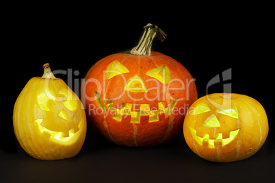 A scary old jack-o-lantern on black.