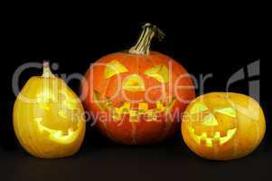 A scary old jack-o-lantern on black.