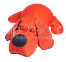 Red toy dog on a white background