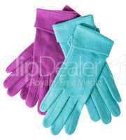 Multi-coloured woollen gloves on a white background