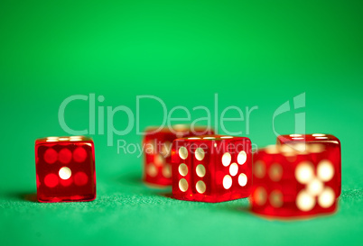 red dices on green cloth
