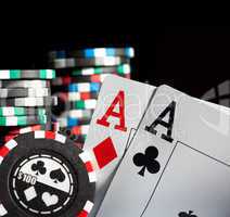 gambling chips and aces