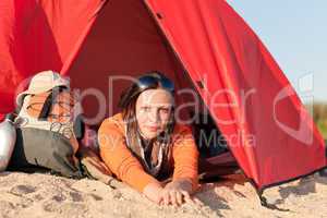 Camping happy woman relax tent on beach