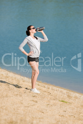 Summer sport fit woman drink water bottle