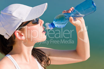 Summer sport fit woman drink water bottle