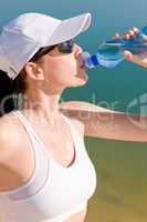 Summer sport fit woman drink water bottle