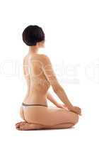 nude beauty woman sit back in yoga pose isolated
