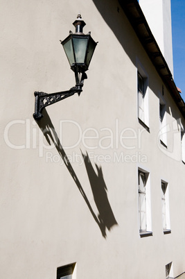 Ancient lantern on a wall