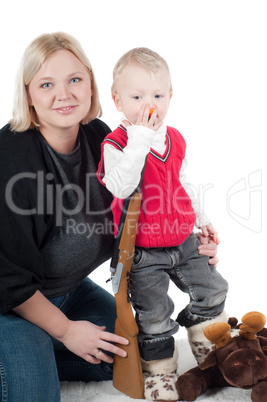 Little boy playing with gun