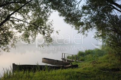 Boats in a morning fog