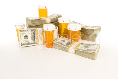 Medicine Bottles and Stacks of Hundreds of Dollars