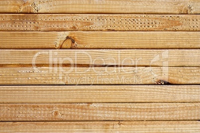 Close-up of grain on stacked lumber