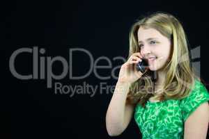 Young girl using a cell phone