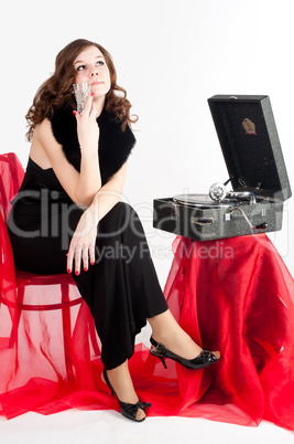 Beautiful woman with gramophone,