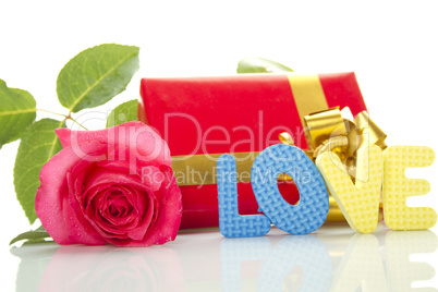 Red Rose, gift box and the text "LOVE"