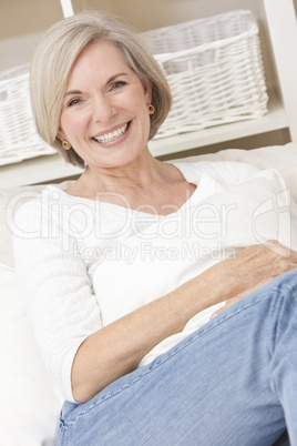 Portrait of Attractive Senior Woman Relaxing At Home