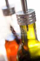 Bottles of Olive Oil and Chili Oil in Restaurant