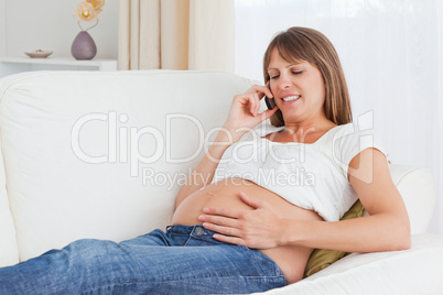 Pregnant woman phoning