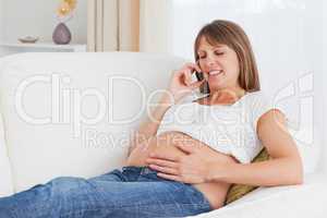 Pregnant woman phoning