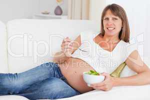 Mother to be eating a salad