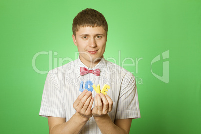 Close-up lover man holding the letter "love"