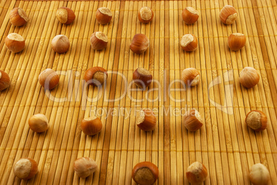 hazelnuts on a bamboo mat