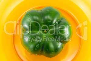 green peppers on a glass plate