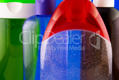 cosmetic containers on a colorful background