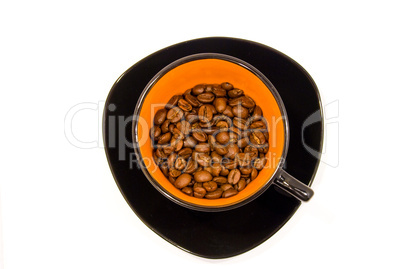 cup with coffee beans isolated on white