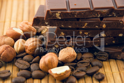 chocolate and nuts on a bamboo mat